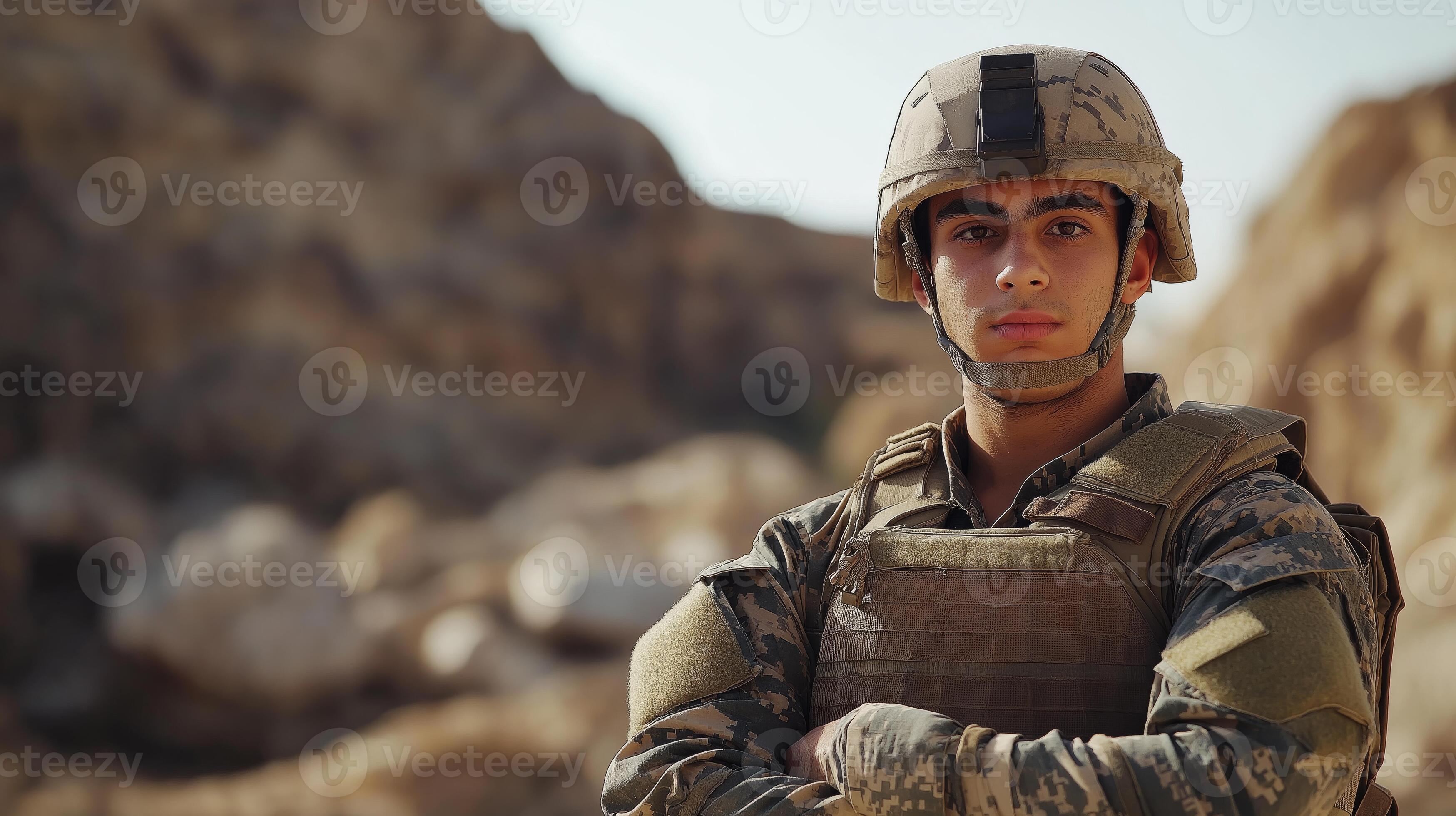 Confident Young Male Arab Soldier in Military Gear Standing in a