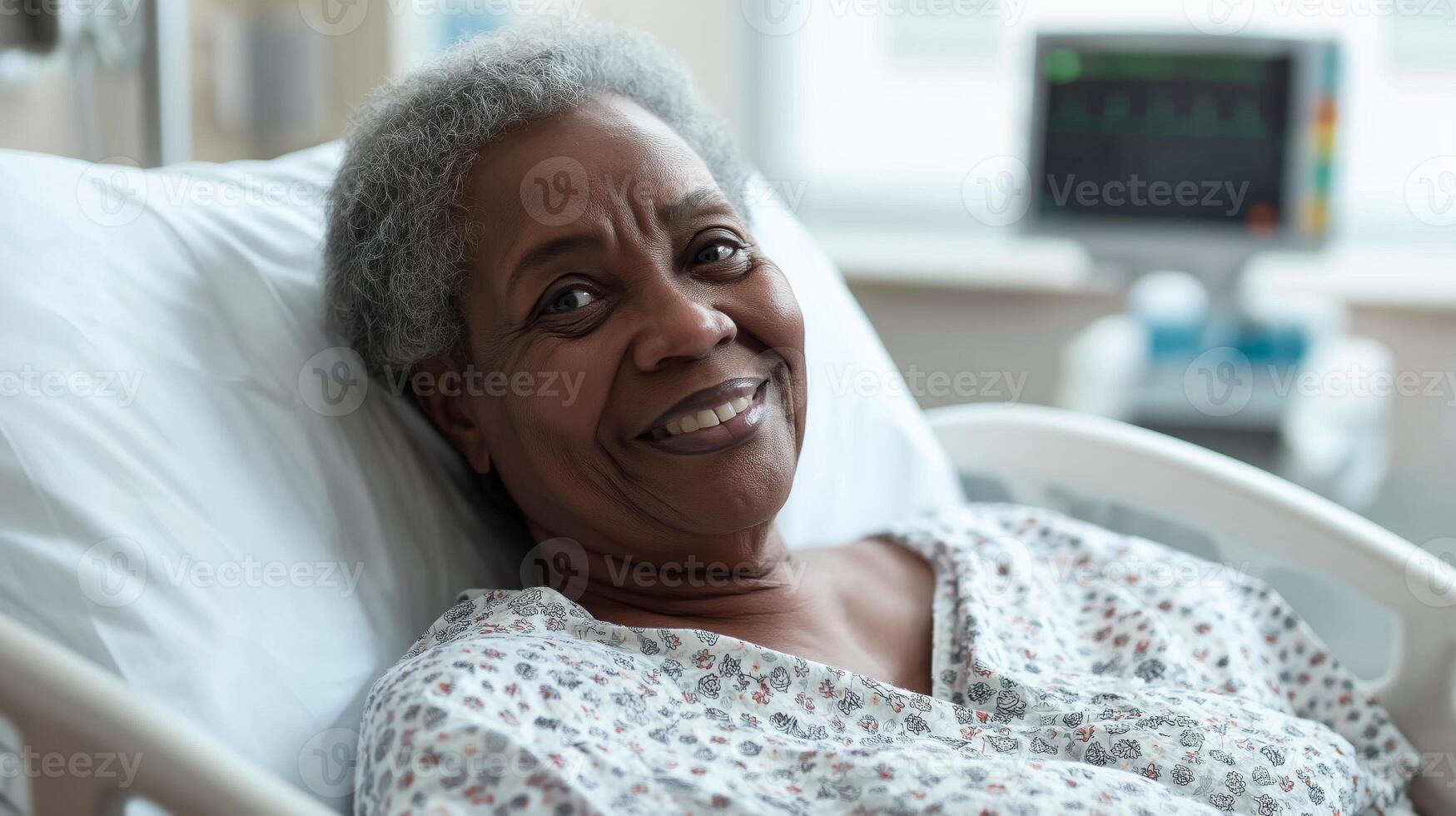 Elderly African American Woman Smiling Comfortably in a Hospital Bed for Healthcare Concept photo