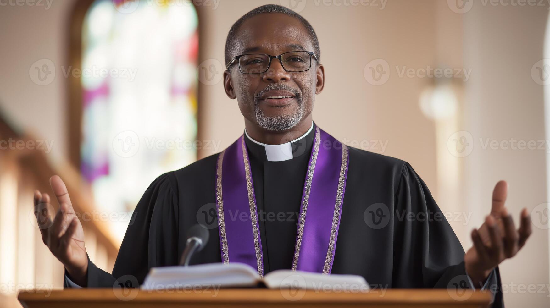 Nigerian Protestant Minister Preaching in Church, Wearing Traditional Clerical Robe and Glasses photo