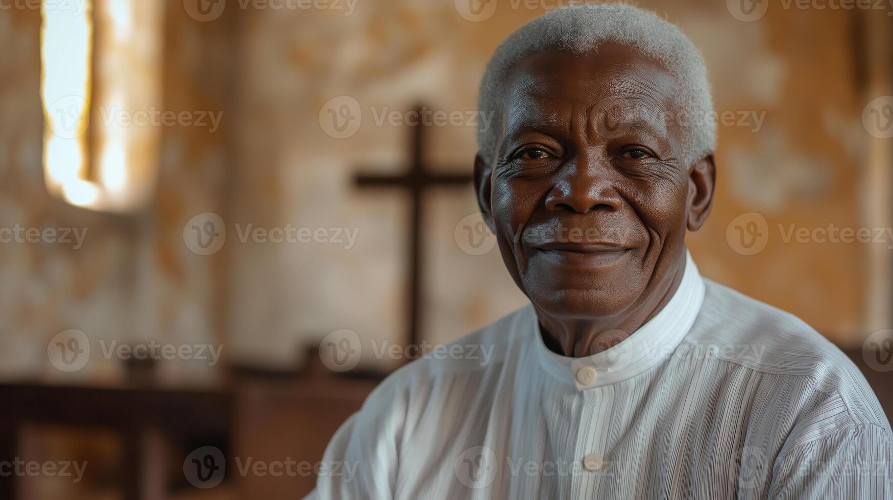 Portrait of a Gentle Smiling Elderly Nigerian Man in Traditional White Attire Inside a Church for Cultural and Religious Concepts photo