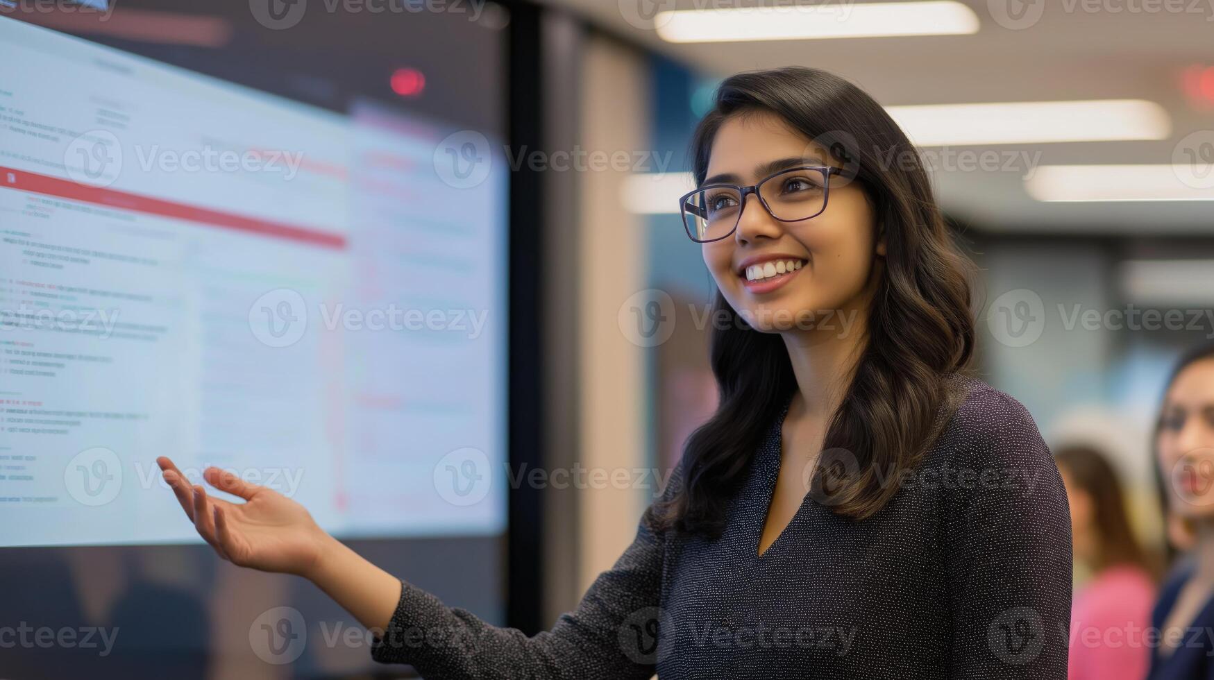 Confident South Asian Businesswoman Presenting in Modern Office Environment for Corporate Design photo