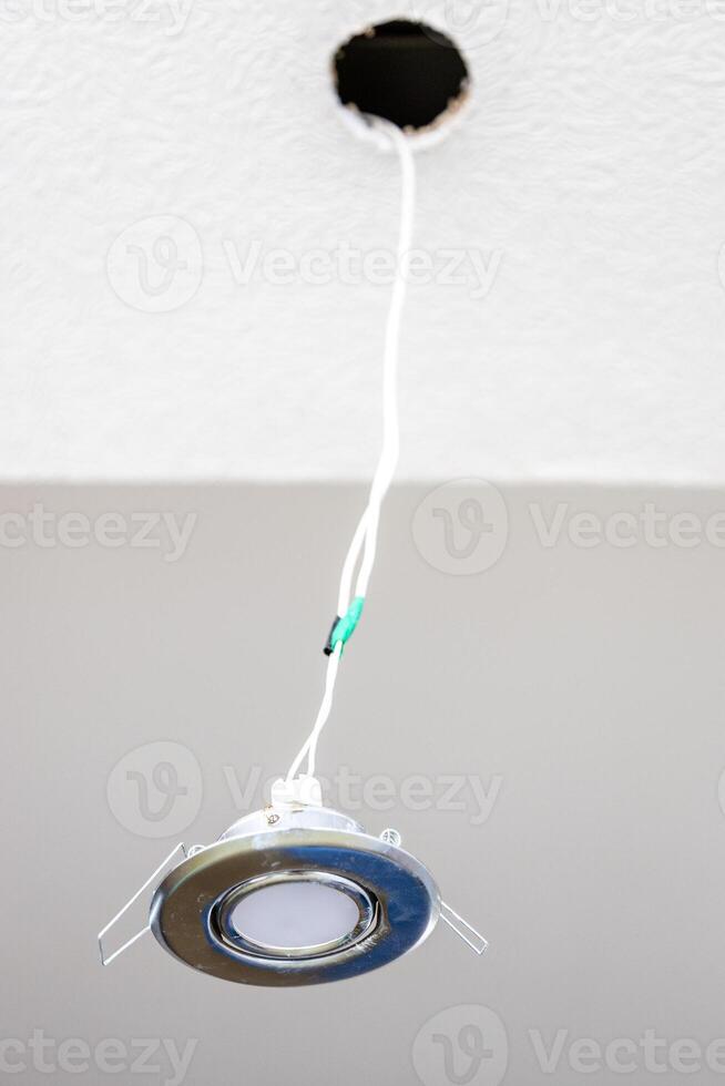 repairing built-in ceiling light photo
