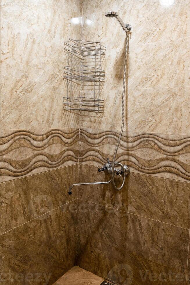 shower stand in rustic guest house photo