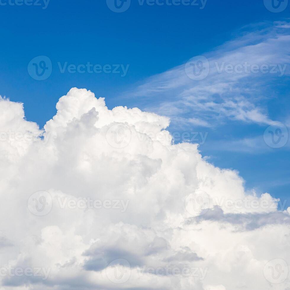 large white cumuli cloud in blue sky photo