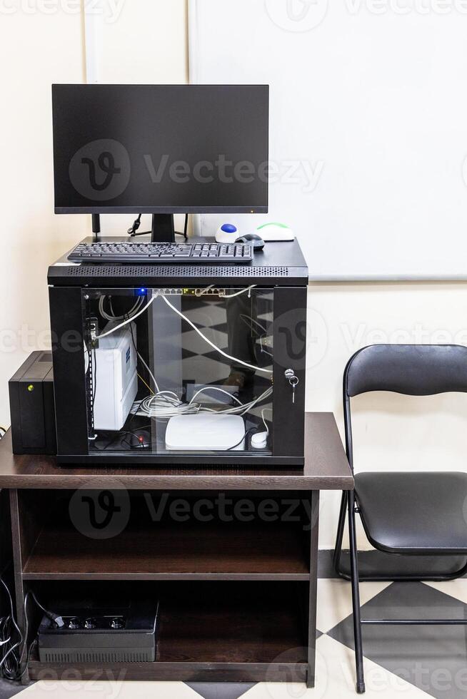 pedestal with server, router, computer monitor photo