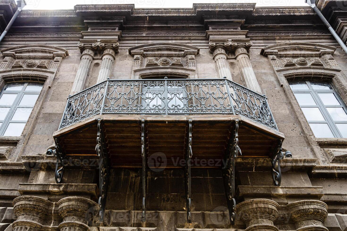 openwork balcony of residential house in Gyumri photo