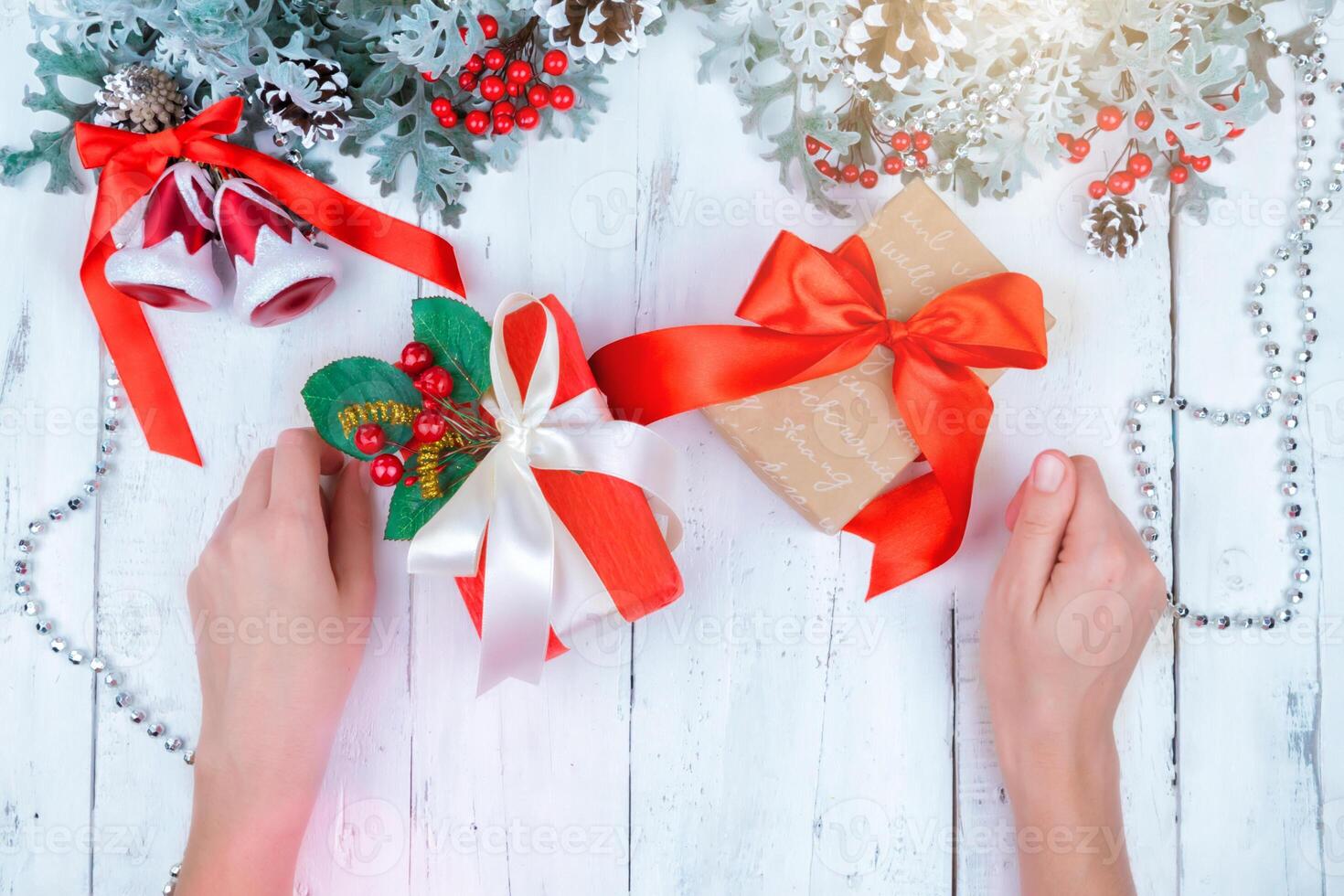 Christmas wooden background with snow branch. Top view with copy space for your text photo