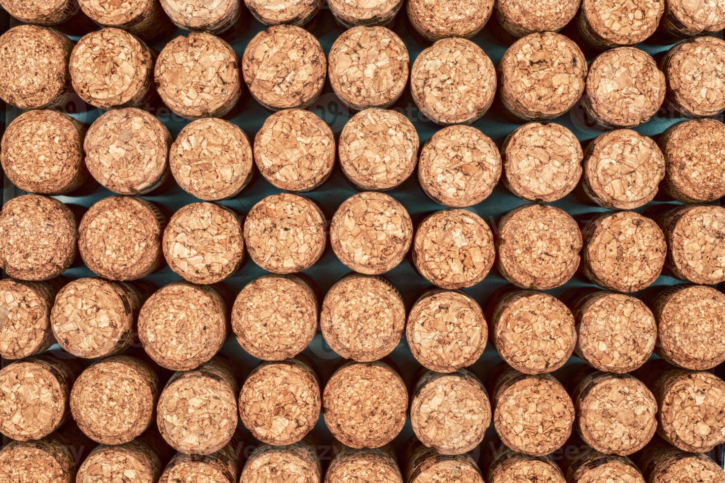 Background from textured wine corks, top view. place for text photo