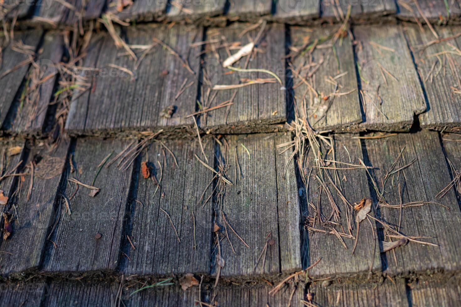 old wooden house, old windows, old building. wooden roof shingle photo