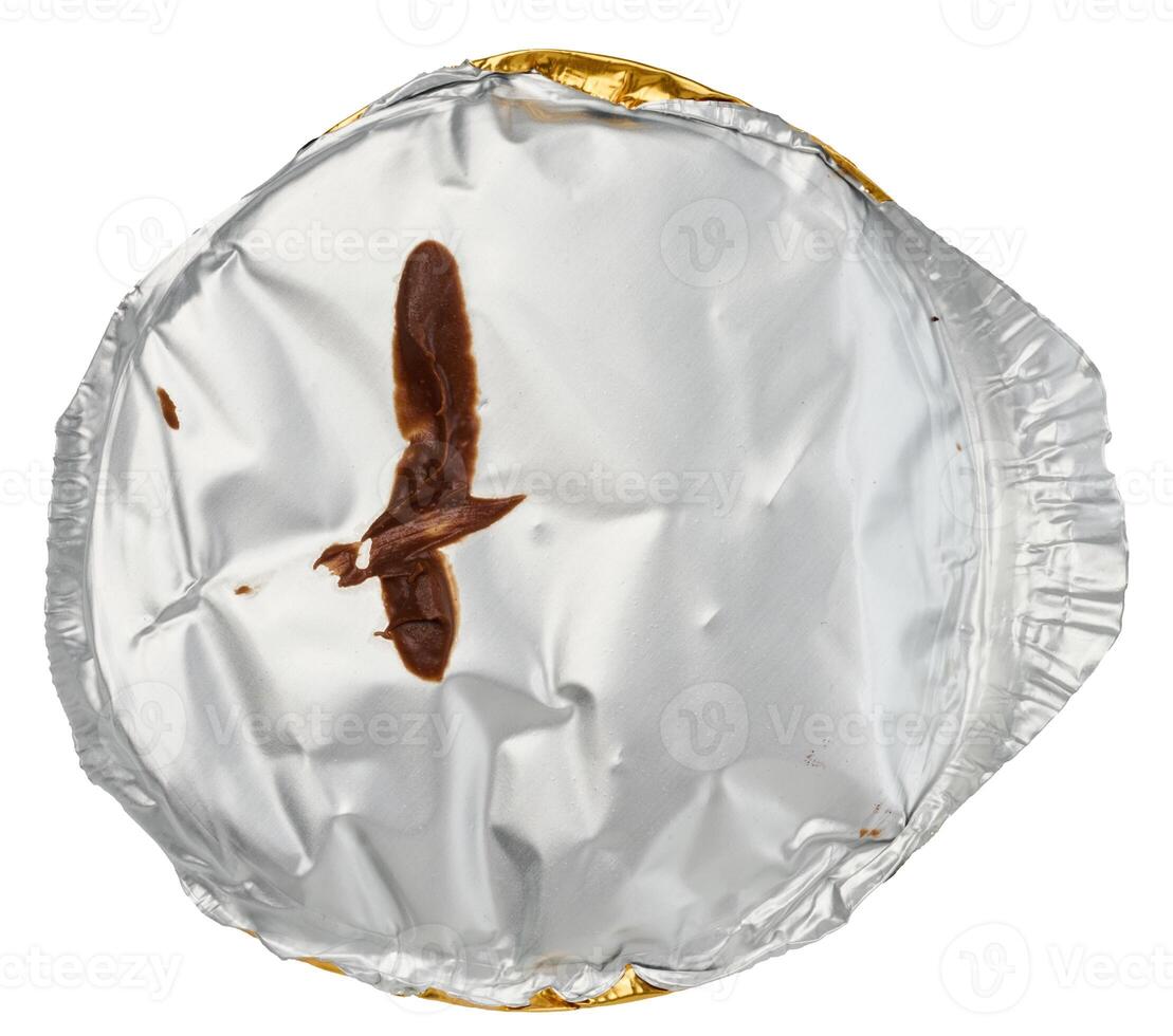 Round aluminum thin lid for plastic yogurt jars, sour cream on a white background, top view photo