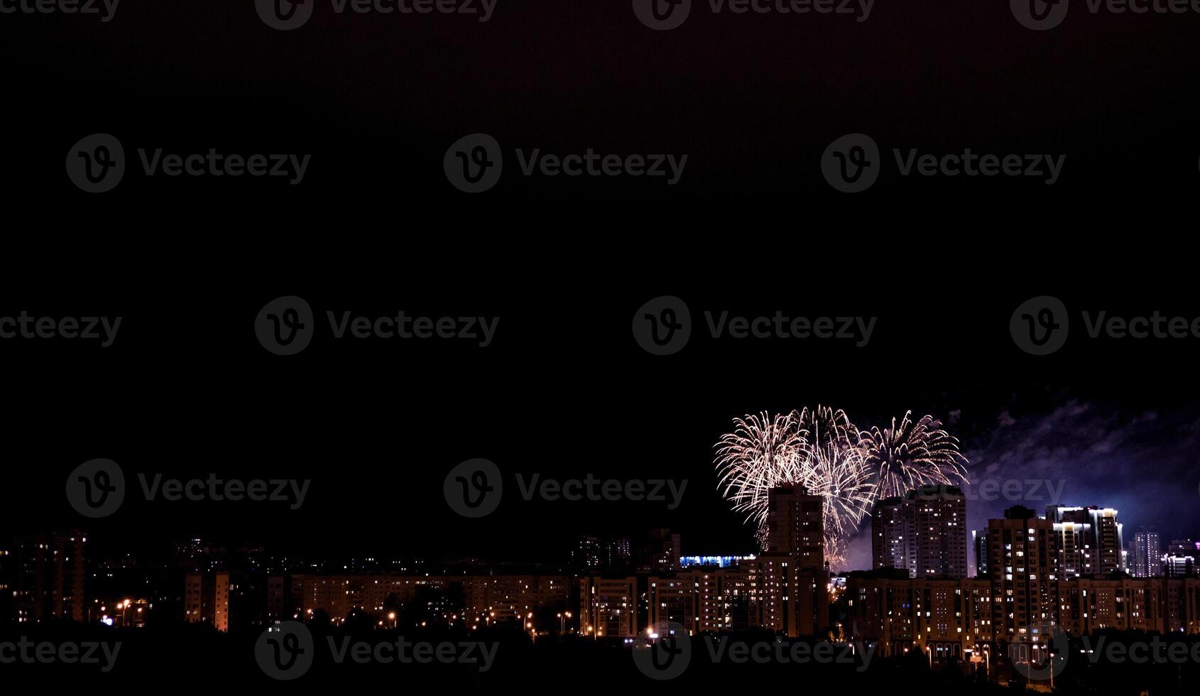 Series of fireworks in night city photo
