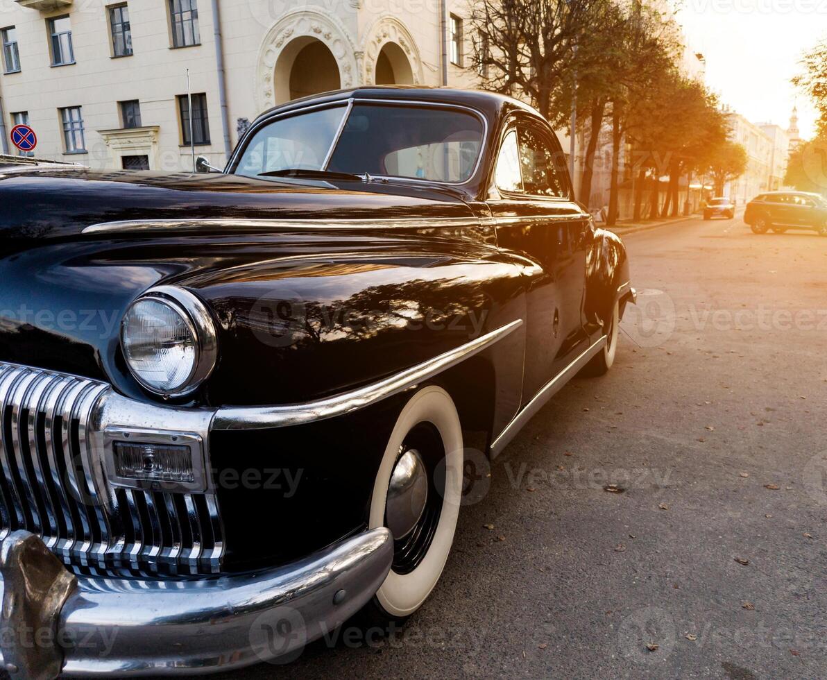 retro car on sunset. photo