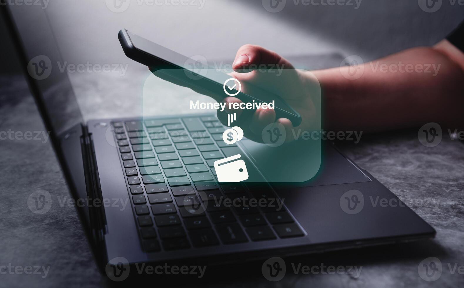 Woman transfering money online using apps on smartphone. Selective focus. Concept of financial transactions with mobile devices. Smartphone screen displaying money transfer confirmation. photo