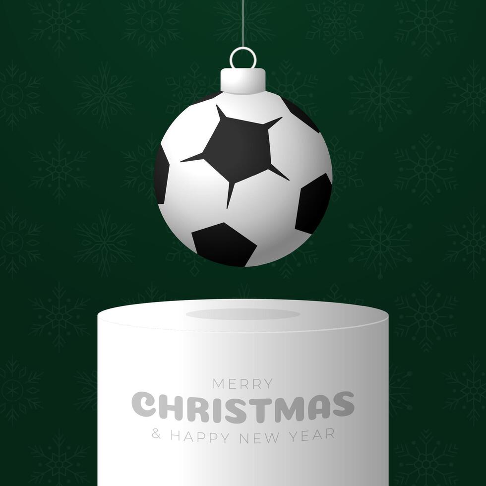 soccer Christmas Greeting card. Merry Christmas and happy new year sport greeting card. Hang on a thread green and red xmas ball bauble on green on background. Sport illustration vector