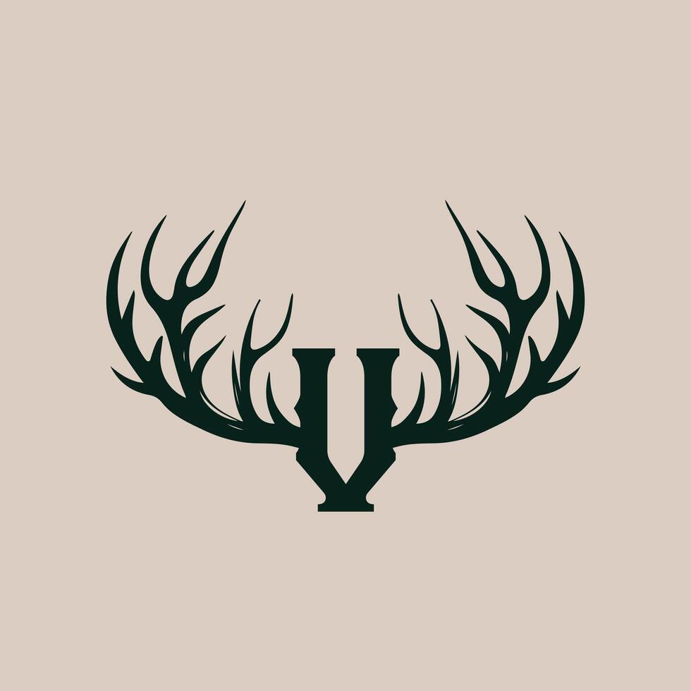 The letter v is shown in a deer head vector