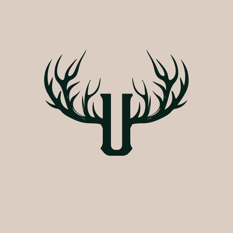 The letter u is shown in a deer head vector