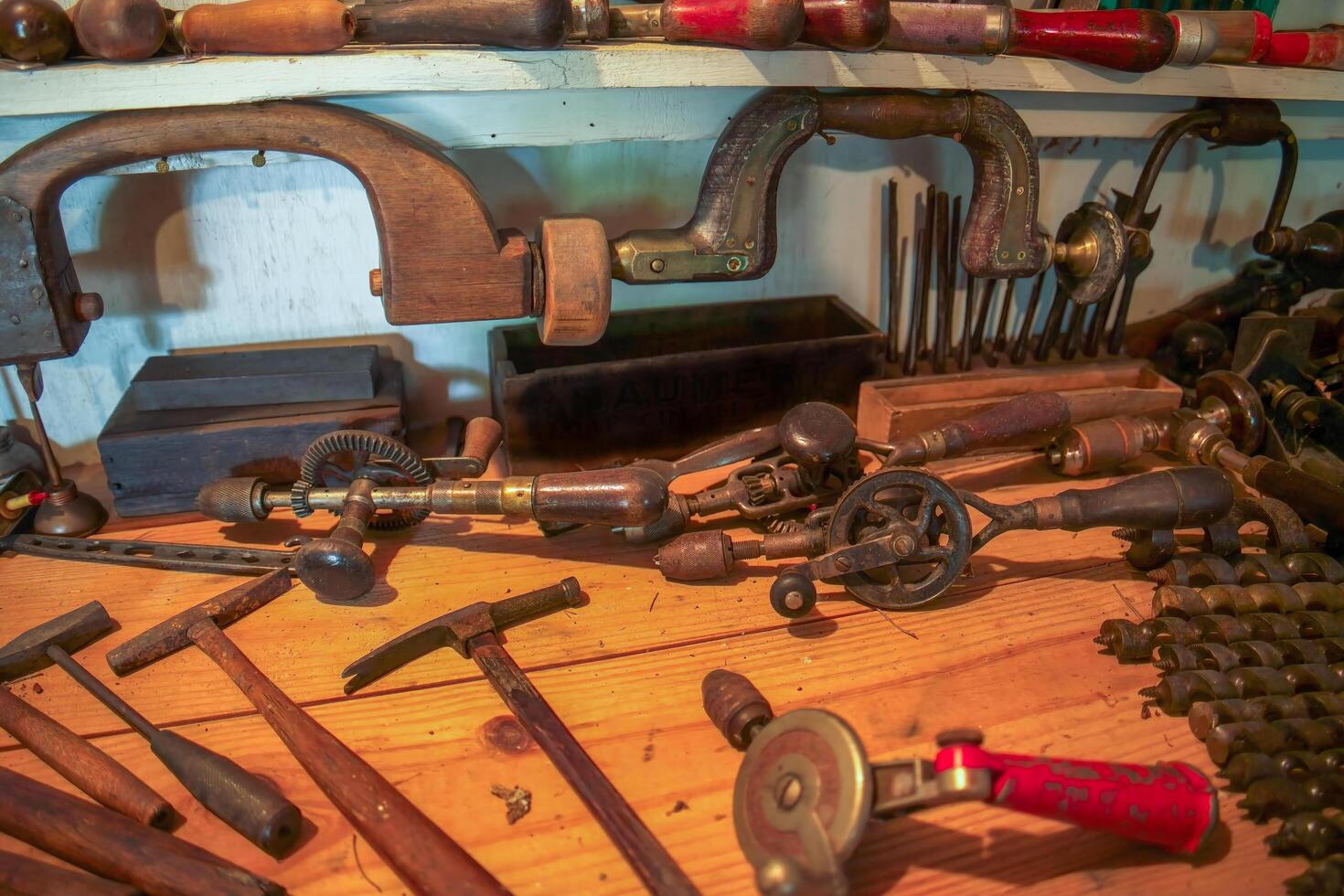 Antique tools on a workbench photo