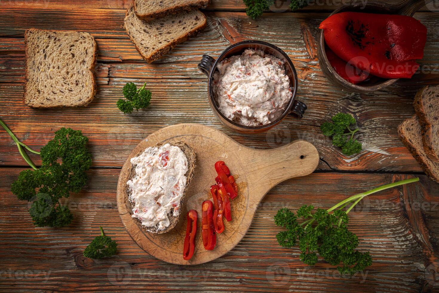 Delicious creamy spread with roasted red peppers photo