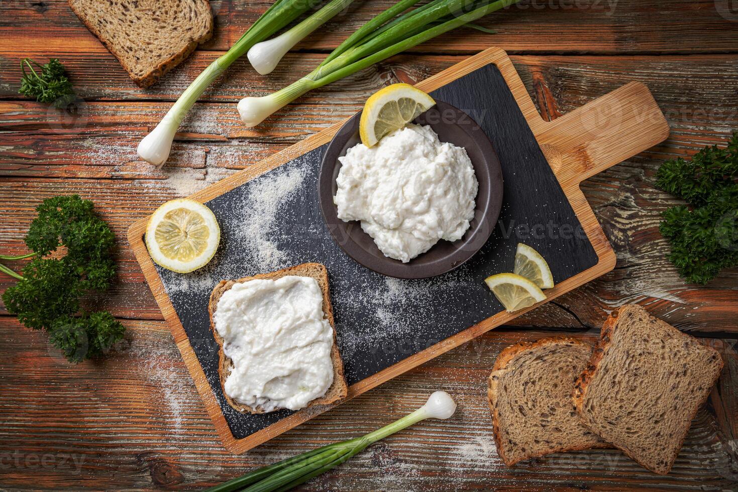 Rye bread sandwich with white fish roe spread photo