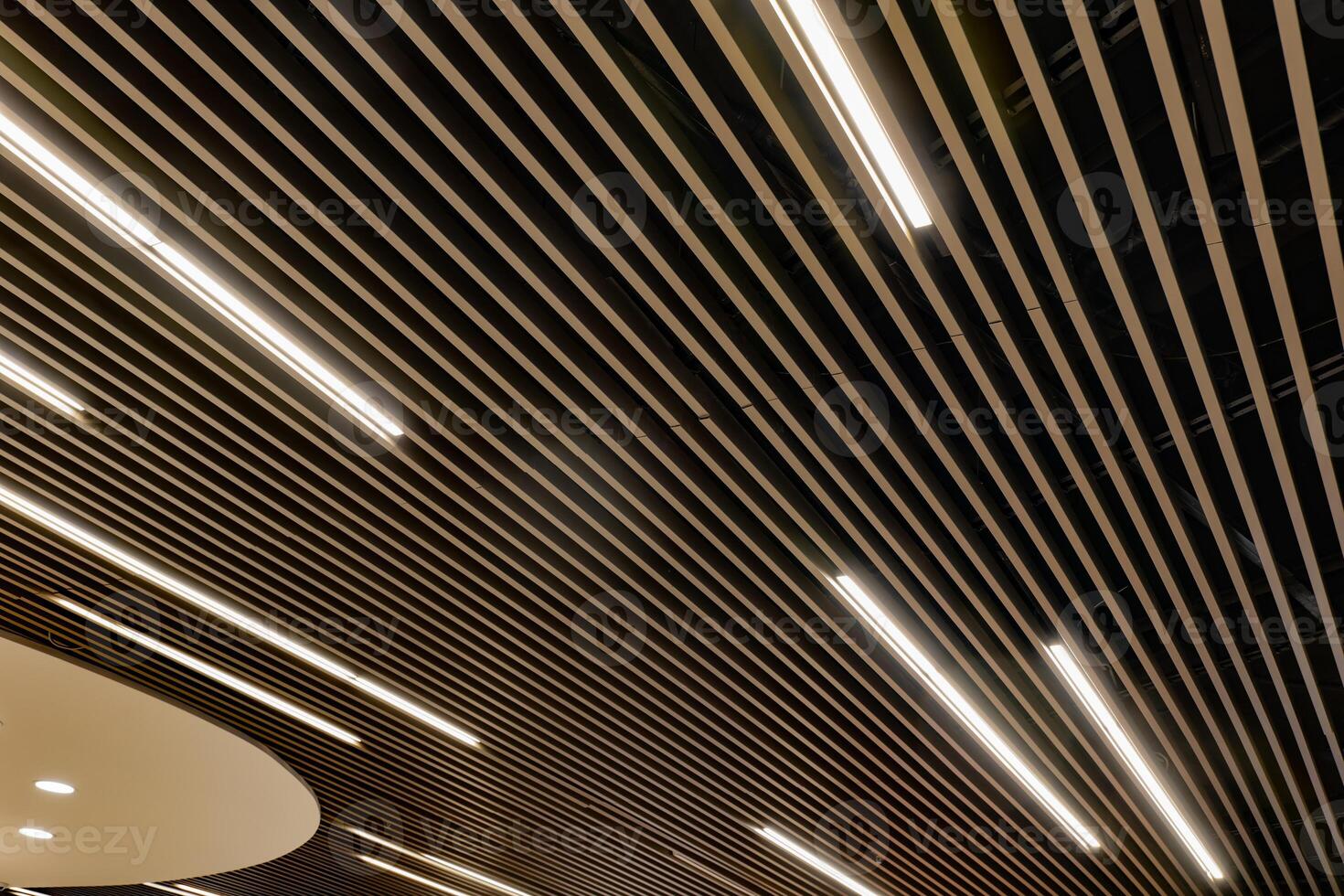 the ceiling is lit up with a series of lights photo