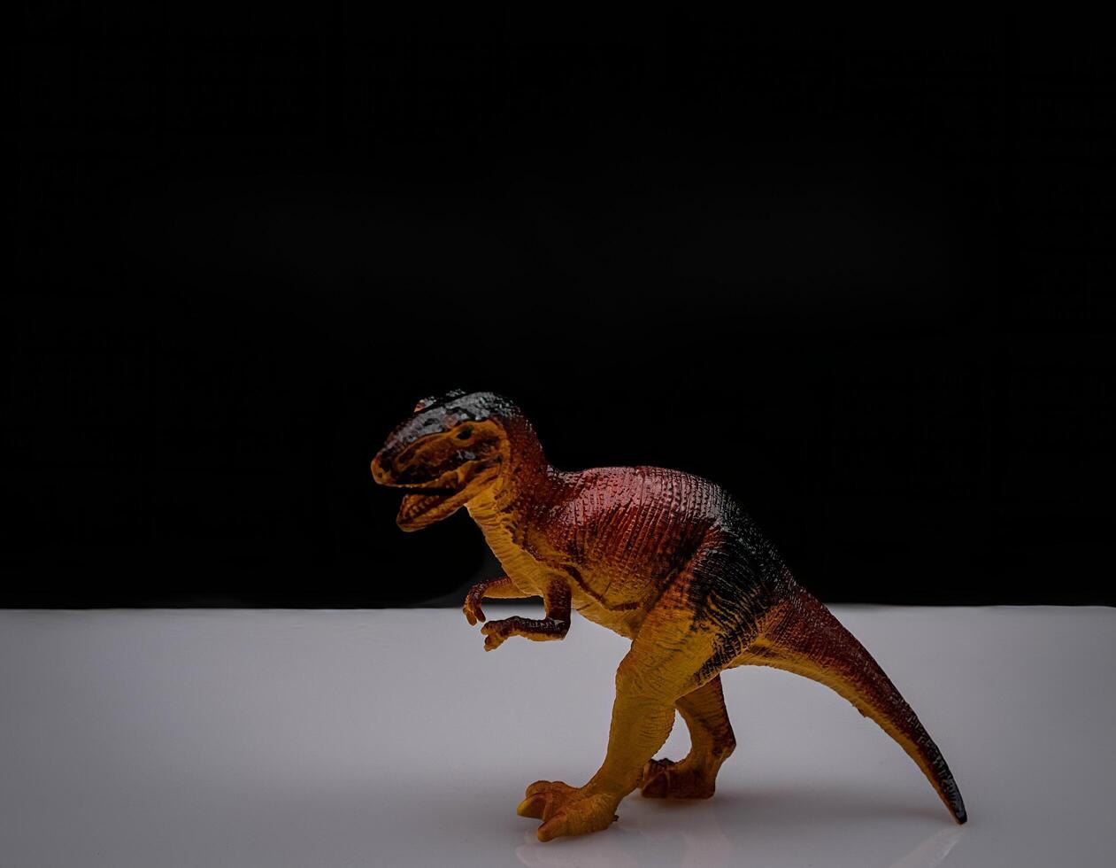 Tyrannosaurus rex is an extinct genus of tyrannosaurid theropod dinosaur that lived in the Late Cretaceous. It was a bipedal carnivore with a broad, massive skull, balanced by a long, heavy tail. photo