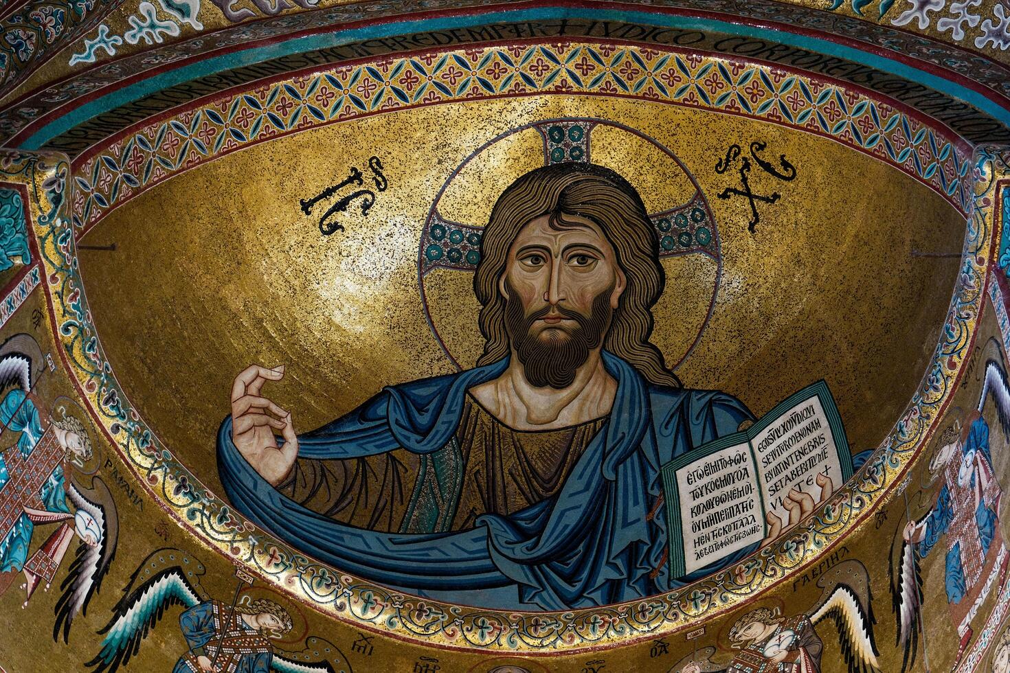 in the Cathedral of Cefalu dominates the Pantocrator. Face of Christ who is transfigured before Peter, James and John. Face that proclaims itself the light of the world. photo