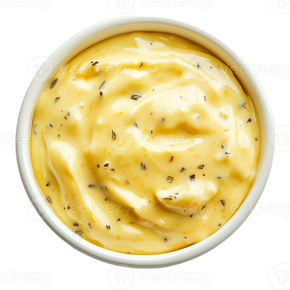 A bowl of mustard with black pepper on top png