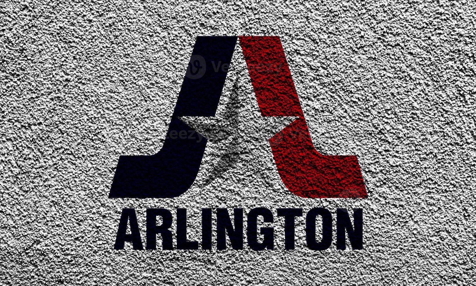 Flag of the city of Arlington, Texas, USA, on a background of a plaster wall. Conceptual collage photo