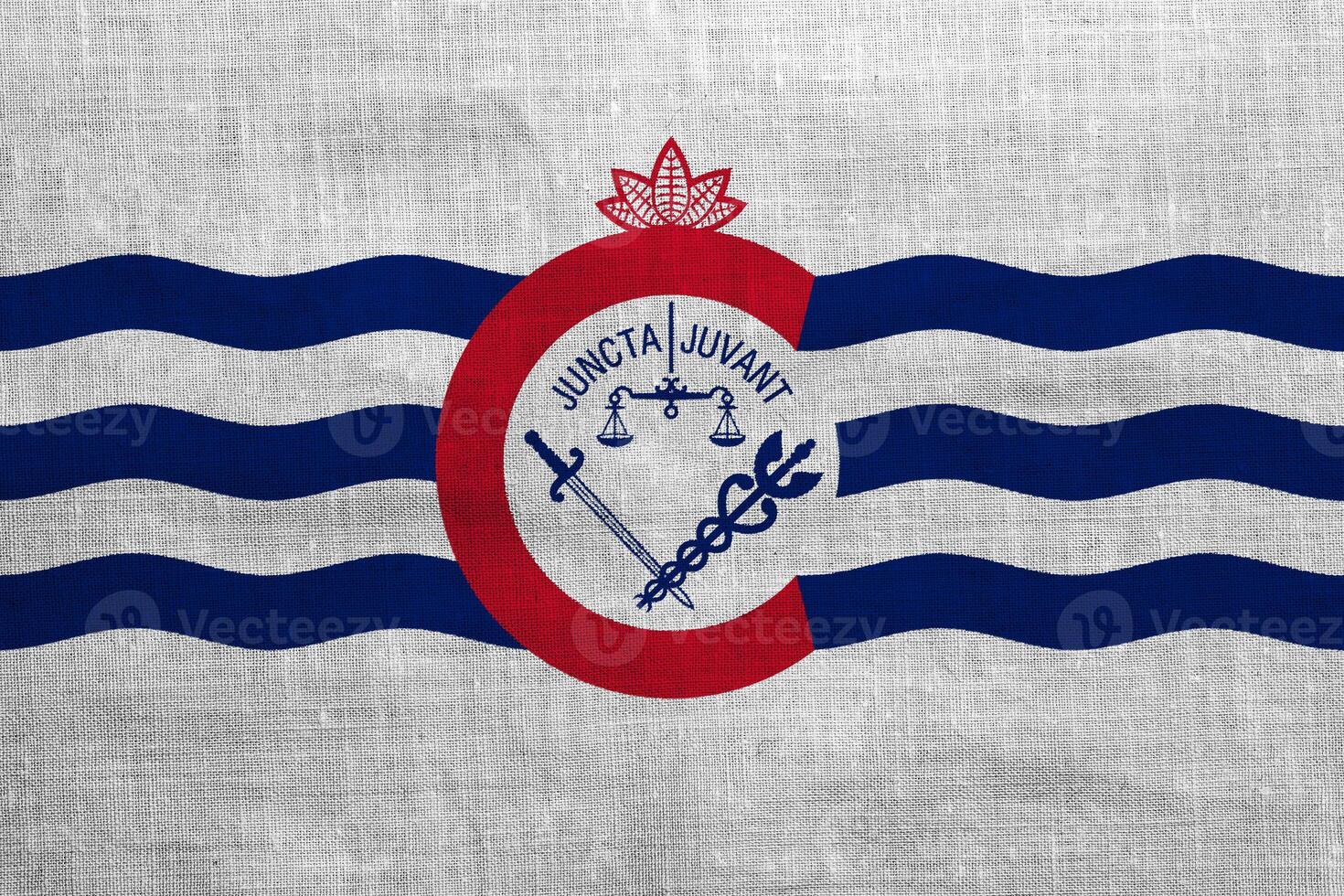 Flag of the city of Cincinnati, Ohio, USA, on a background of fabric texture. Conceptual collage photo