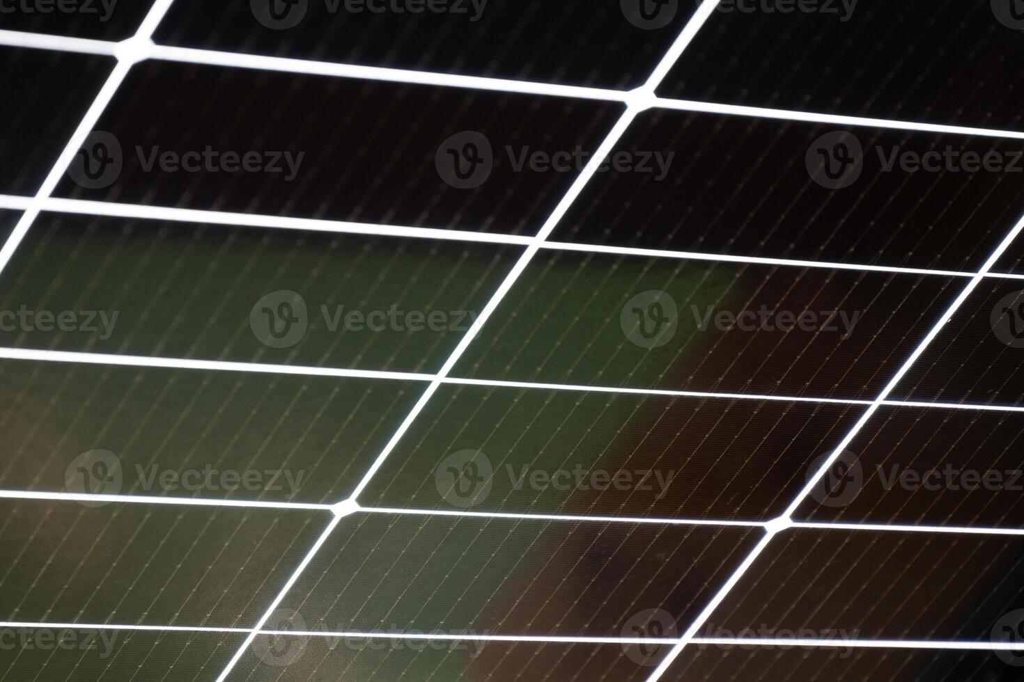 Closeup image of a high efficiency solar panel showcasing its grid pattern design photo