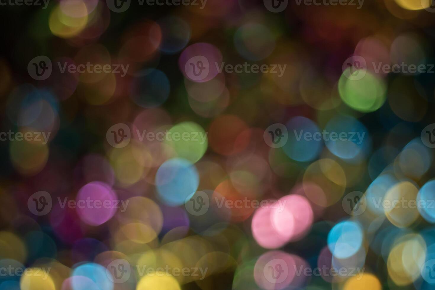 Abstract colorful bokeh defocused party lights background. photo