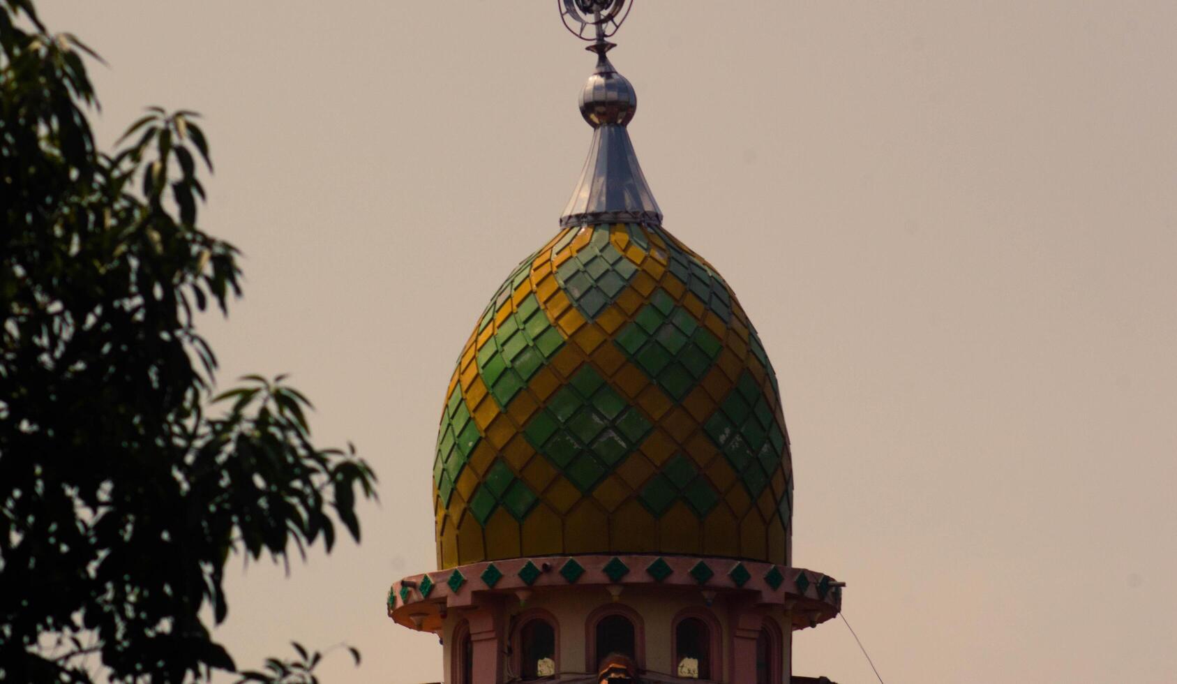view of the mosque dome with a clear sky photo