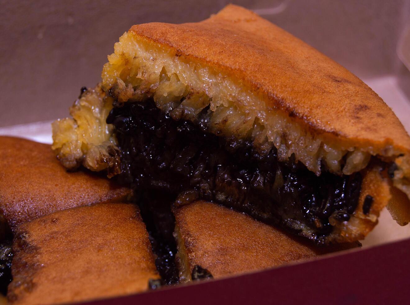 terang bulan with chocolate flavor. sweet martabak with chocolate flavor. snacks that are often sold on Indonesian roadsides. photo