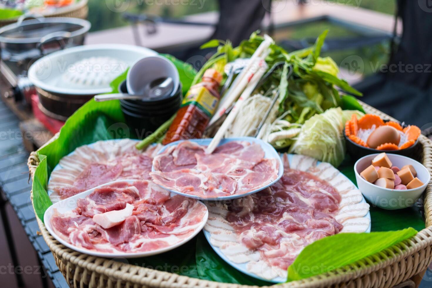 Set of Thai barbecue in the evening at mountain view background. photo