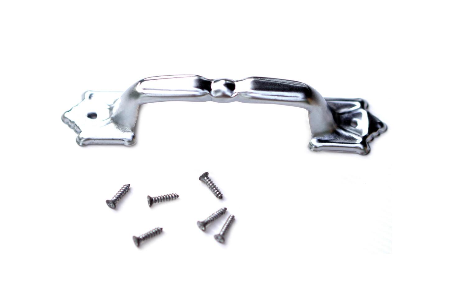 Metal door handle and screws, isolated on white background. Concept, Tools or equipment for craft, diy, fix or repair furniture. Building materials. Construction equipment. Install in door or window. photo