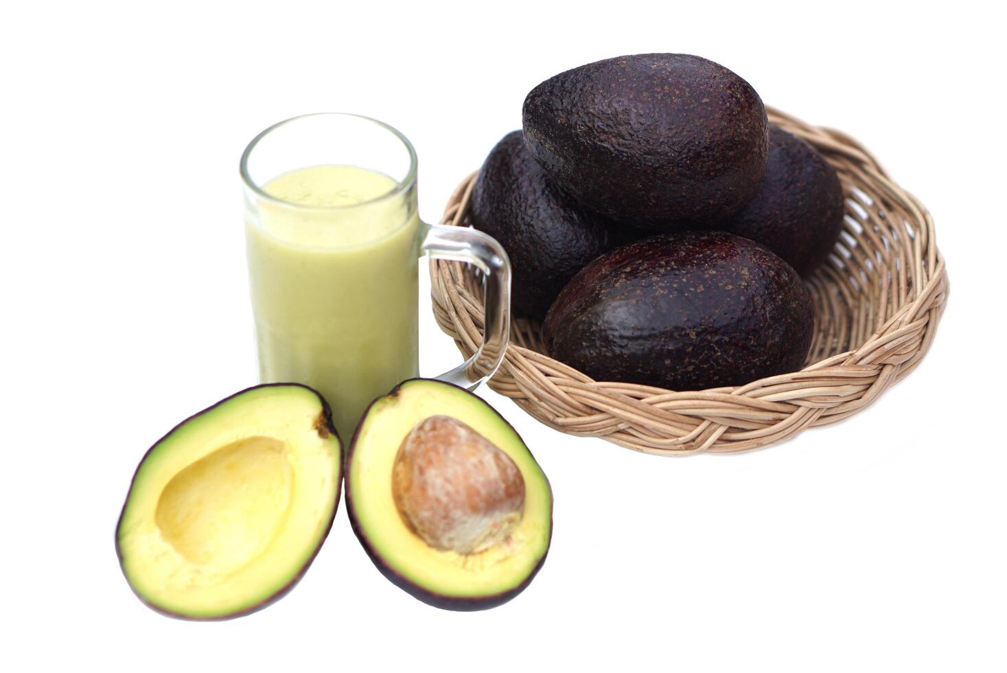 Smoothie avocado fruits, isolated on white background. Concept, healthy beverage for health. Well being and weight loss menu. Homemade refreshing fruit drinks. High fibers, detox. photo