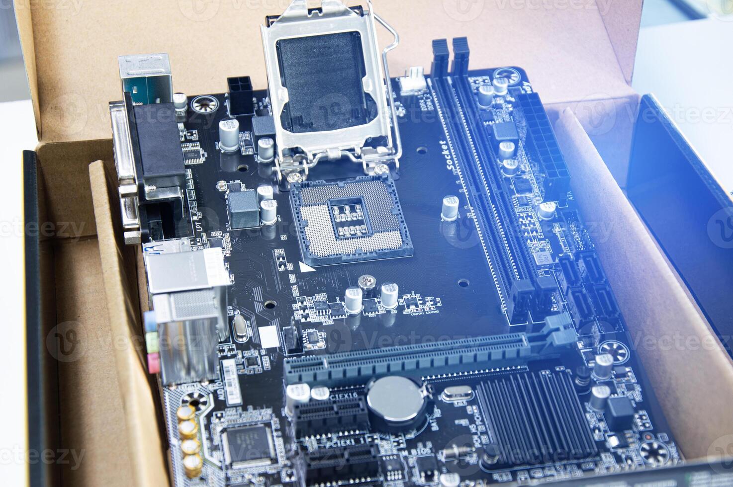 Top view of computer motherboard. Computer components. Motherboard and circuitry. photo