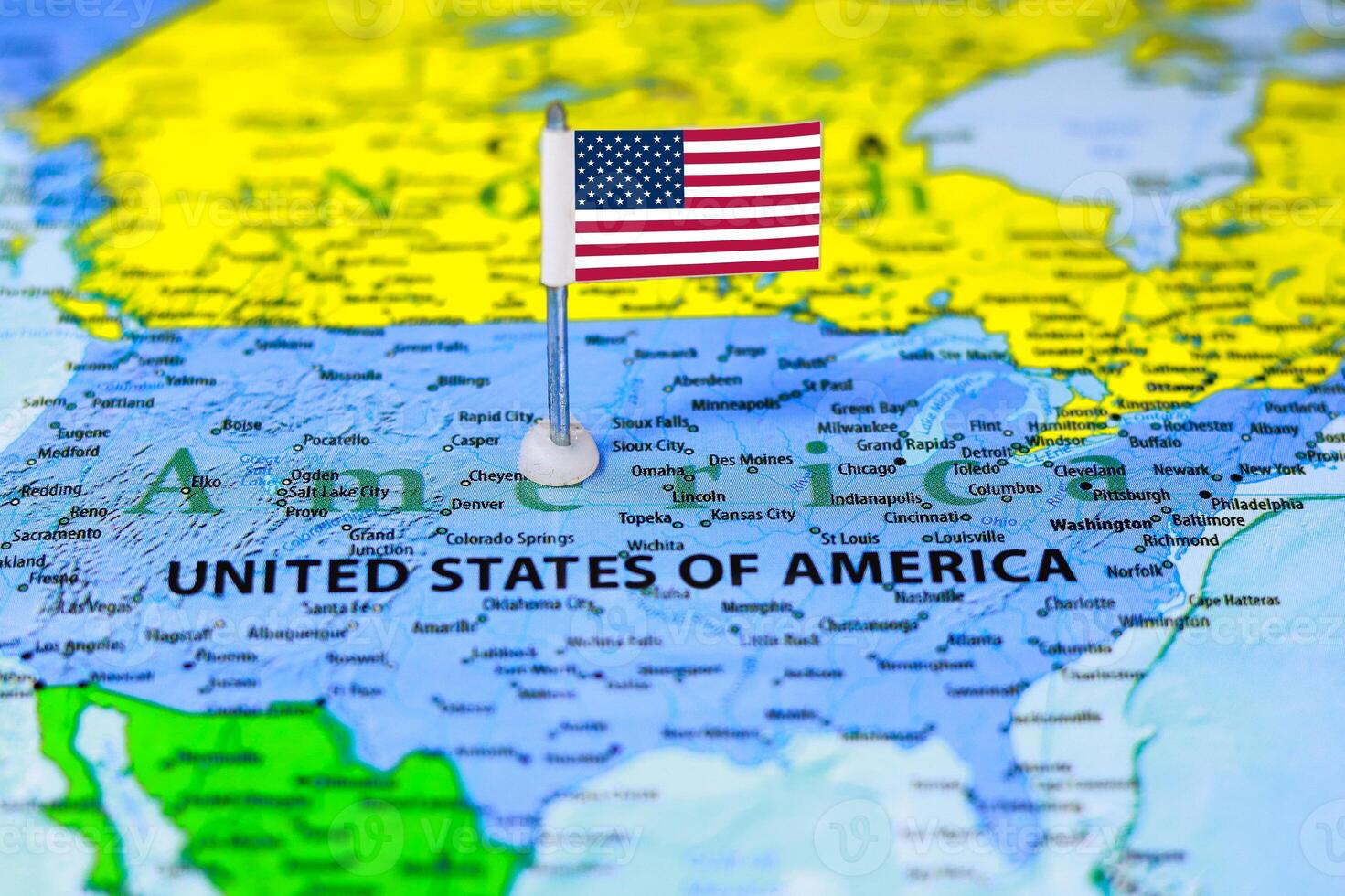 United States of America flag on the map with selective focus and shallow DOF photo