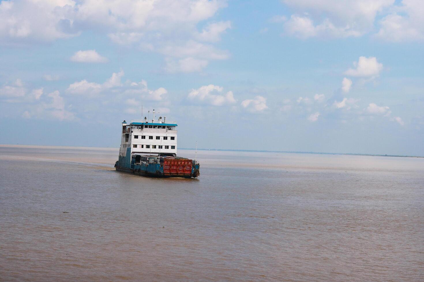 Ferry ship on the Padma River in Bangladesh. This is the largest river in Bangladesh. photo