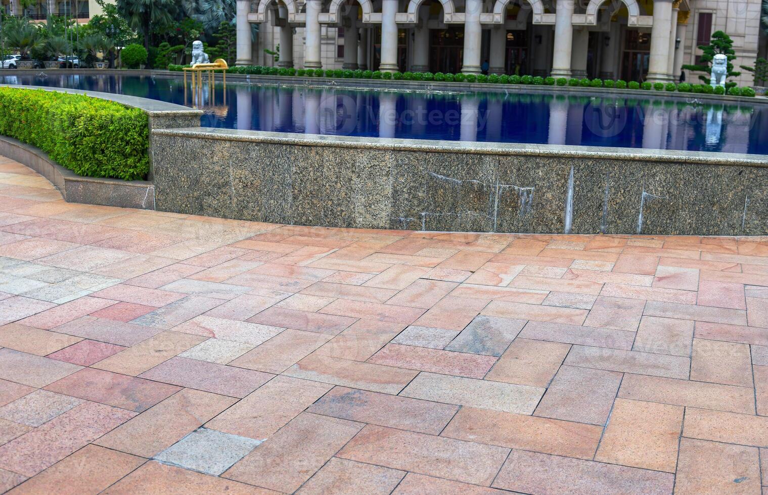 Fountain Water decorations among greenery and modern design photo