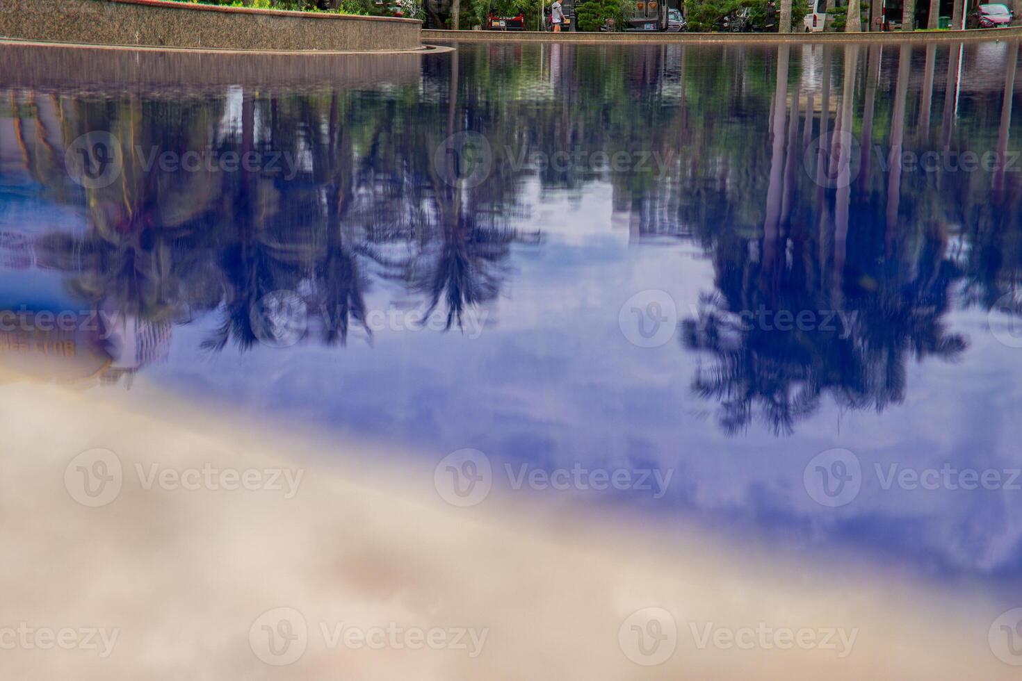 Fountain Water decorations among greenery and modern design photo