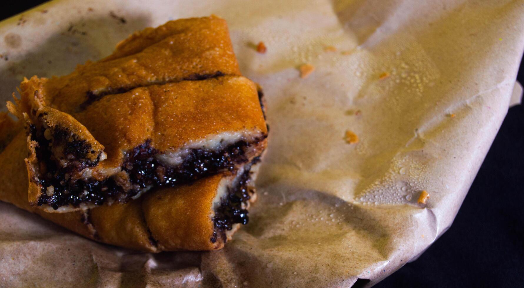 shot on terang bulan or sweet martabak. typical Indonesian food. photo