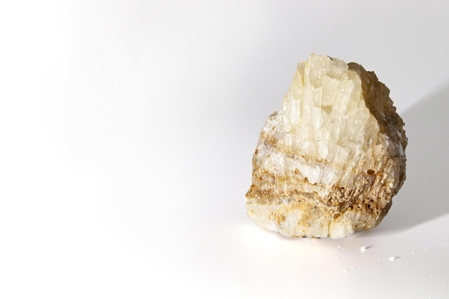 Crystal isolated on white background, side view. Horizontal photo