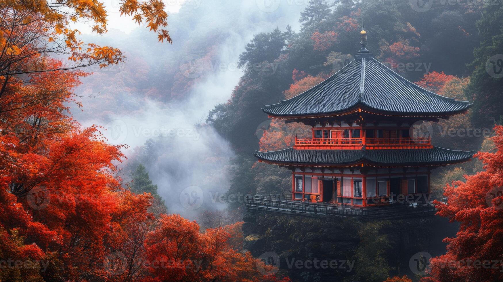 Pagoda Perched on a Cliff Amidst Red Autumn Foliage and Fog photo