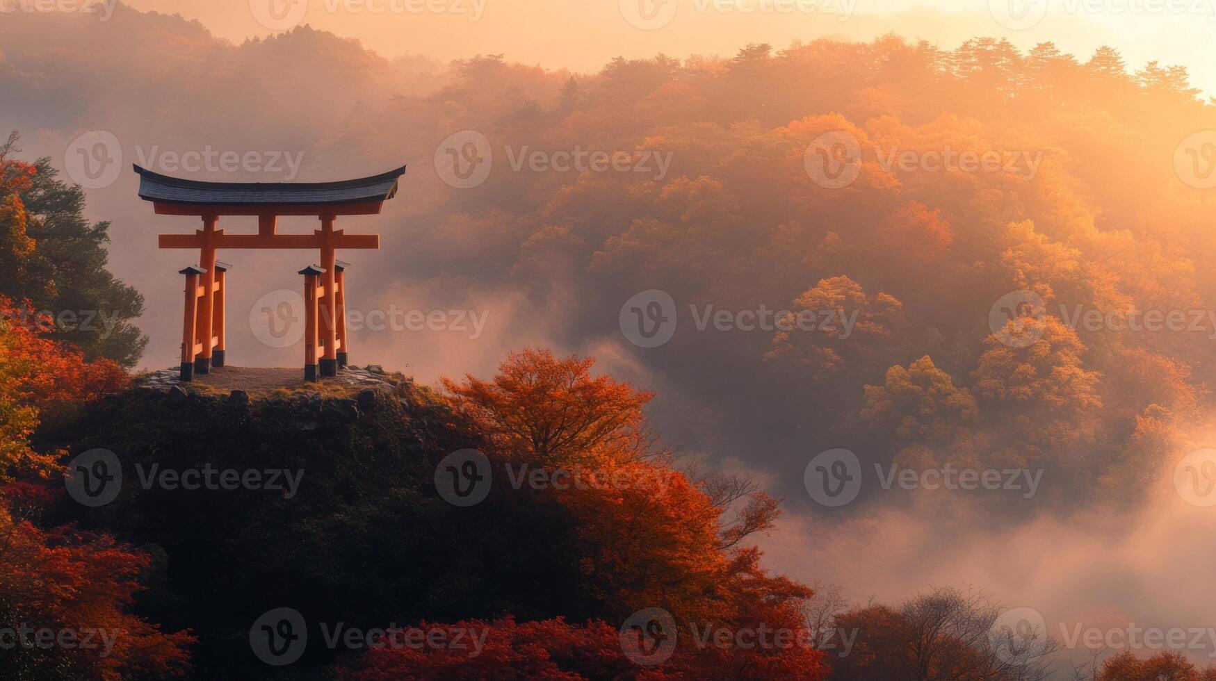 A Torii Gate Perched on a Cliff Overlooking a Misty Forest in Autumn photo