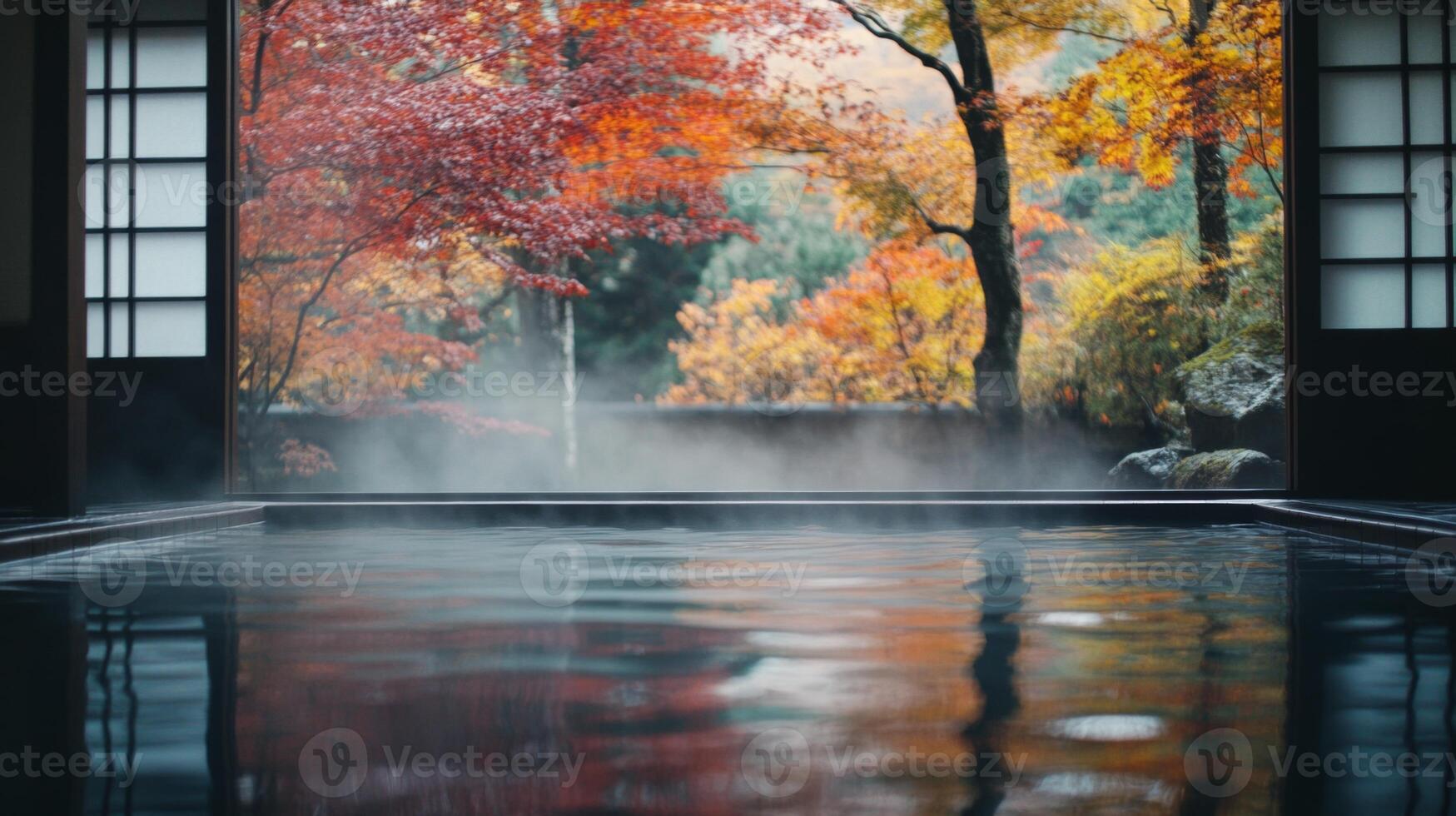 A Tranquil Onsen Bath with an Autumnal View photo