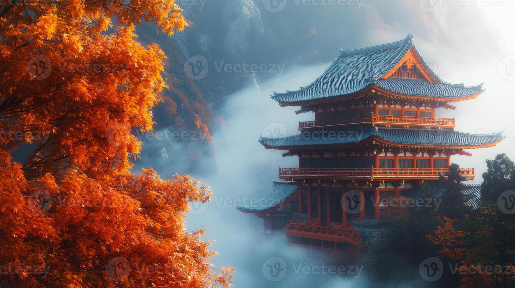 Red-Leafed Tree and Foggy Pagoda in a Mountainous Setting photo