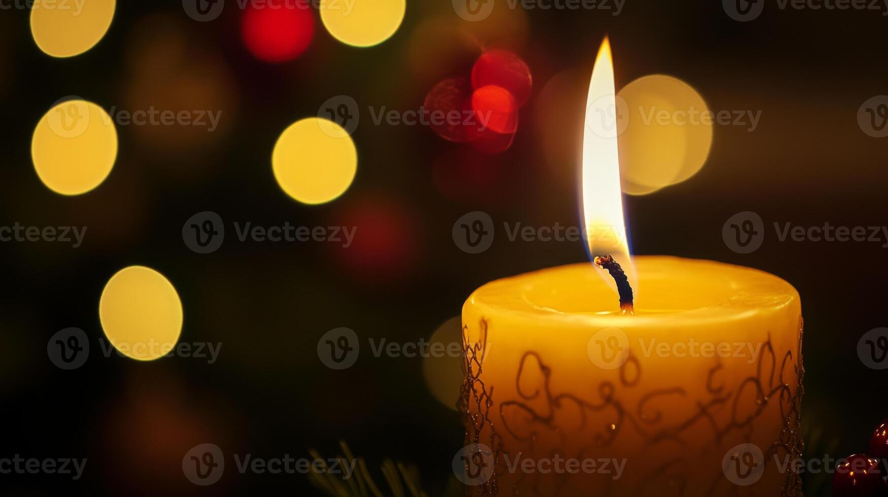 A Lit Candle with Bokeh Lights in the Background photo