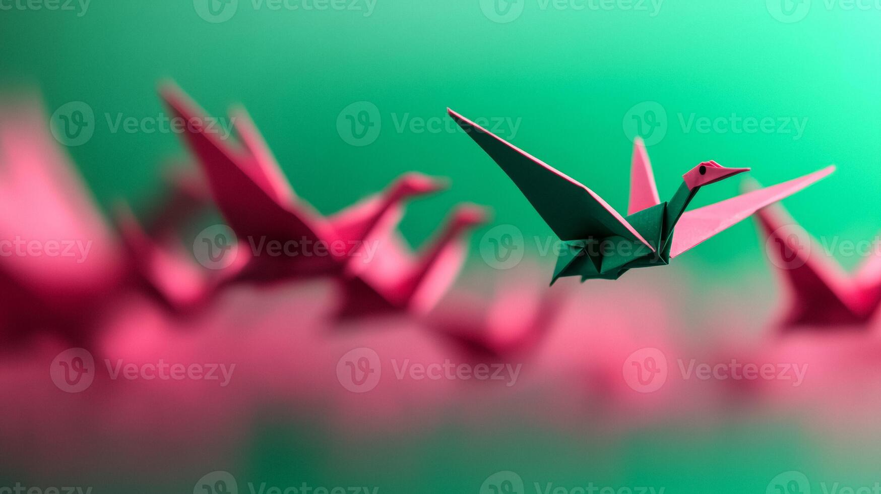 Origami cranes soaring over a gradient of emerald green to magenta symbolizing new beginnings photo
