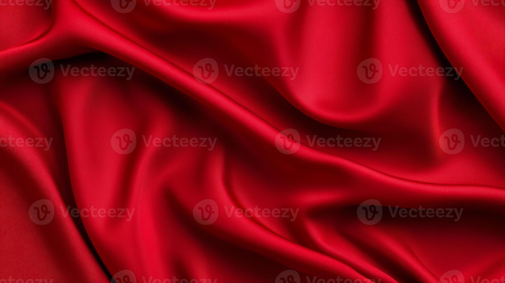 Velvet red cloth with elegant curves and folds reminiscent of rich holiday decor subtle gold accents luxurious fabric texture abstract background for Christmas themes photo